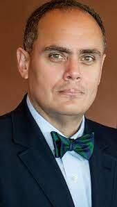 Dr. Alex del Carmen